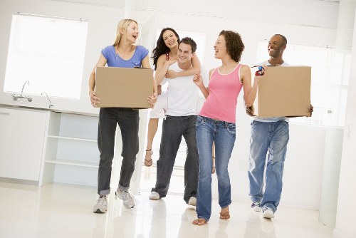 Professional house removals in Southall with moving van outside a residential street
