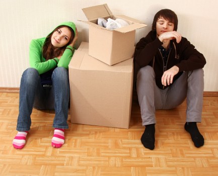 Professional movers handling furniture during a Southall flat move