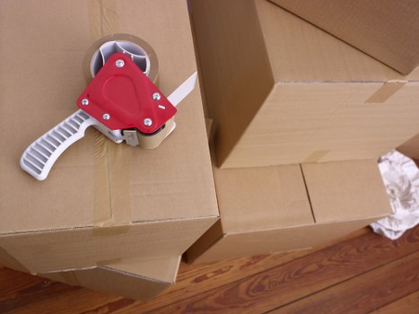 Packed boxes and furniture stored safely in Southall storage